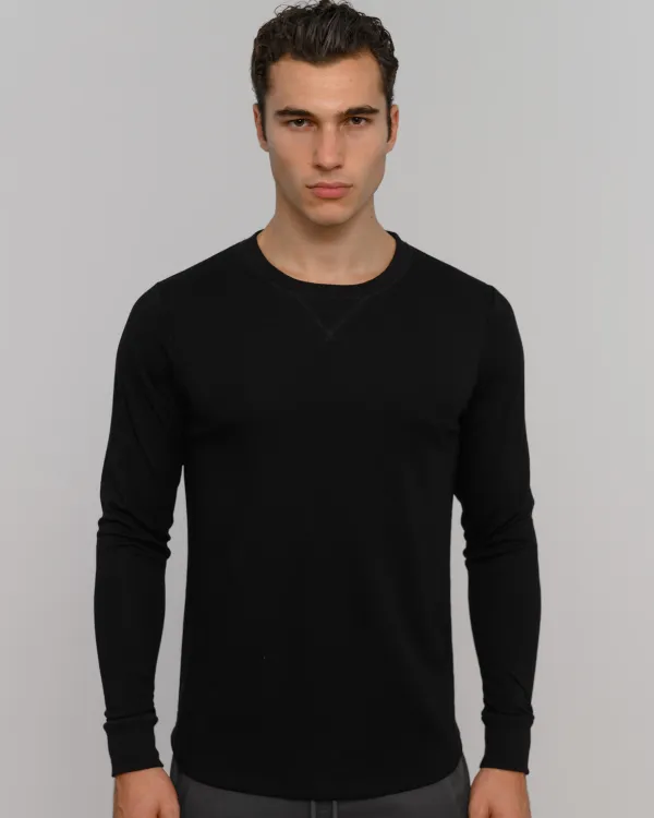 The ESNTLS Black Crew Sweater
