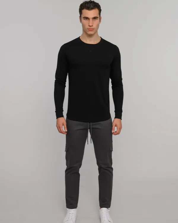 The ESNTLS Black Crew Sweater